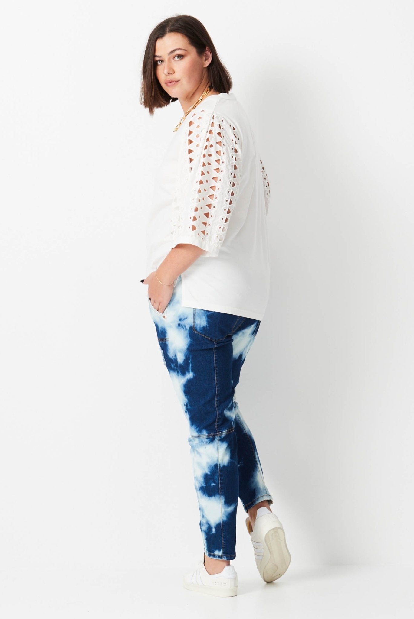 Shibori Keepers - Indigo Wash - 17 Sundays17 SundaysModel wears plus size blue shibori denim jeans. with elastic waist and tapered leg.